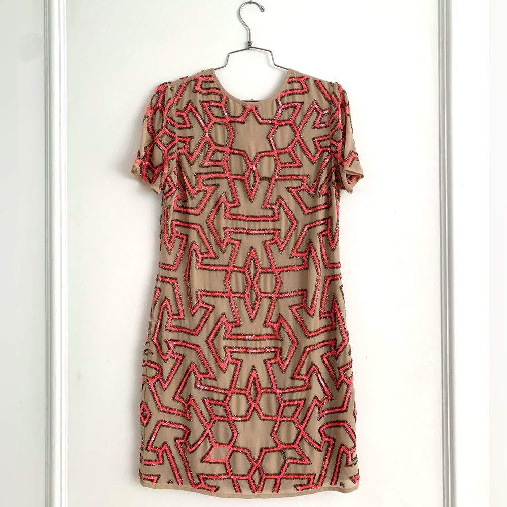 Nude sheath dress with neon pink sequin pattern